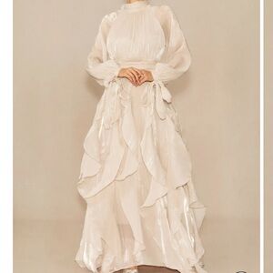 Brand new, unworn dress with tags from sunfere. Size small.